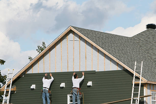 Professional Siding Replacement technician working in Hamptonville, NC